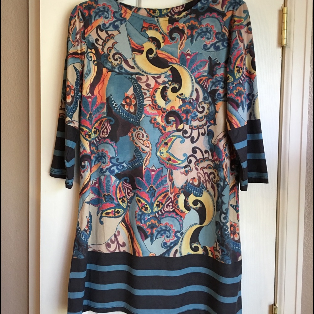 Colorful top for pants or as a mini dress.